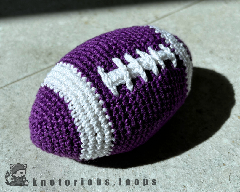 Finished Crochet Football with stripes like in College
