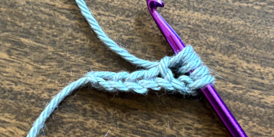 Step 2 of how to crochet a puff stitch Step 2 of how to crochet a puff stitch